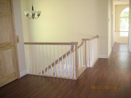 NEW HOUSE BASEMENT AND TWO STORIES TWO CAR GARAGE FRONT PORCH AND REAR DECK OVER GARAGE 10 BEDROOMS