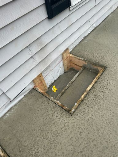 CONCRETE AT REAR